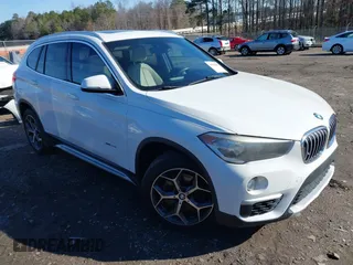 2017 BMW X1 xDrive28i with VIN WBXHT3C37H5F69725, listed as a IAAI auction lot 41588095 with 109,704 mi miles. Bid and sale history available at carsss.com. Image 1.