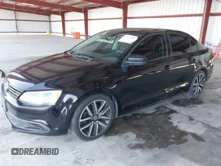 2014 Volkswagen Jetta S z VIN 3VW2K7AJ1EM311148, wystawiony jako IAAI lot #40418942 z przebiegiem 192 015 mil mil oraz . Historia ofert i sprzedaży dostępna na DreamBid. Obrazek 2.