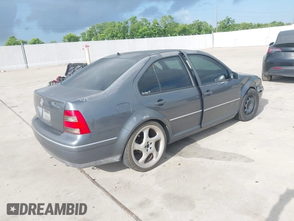 2004 Volkswagen Jetta GL with VIN 3VWRK69MX4M082958, listed as a IAAI auction lot 42524511 with 276,577 mi miles and . Bid and sale history available at DreamBid. Image 4.