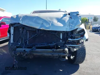2015 Chevrolet Suburban LT z VIN 1GNSCJKC1FR608117, wystawiony jako IAAI lot #41641560 z przebiegiem 163 770 mil mil oraz . Historia ofert i sprzedaży dostępna na DreamBid. Obrazek 13.