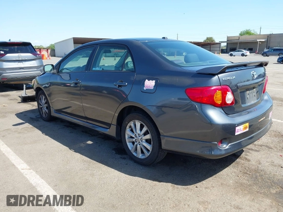 2009 Toyota Corolla with VIN 1NXBU40E69Z034459, listed as a IAAI auction lot 42095649 with 173,296 mi miles. Bid and sale history available at carsss.com. Image 3.