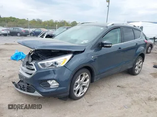 2019 Ford Escape Titanium with VIN 1FMCU9J95KUC19062, listed as a IAAI auction lot 42112188 with 26,100 mi miles. Bid and sale history available at carsss.com. Image 2.