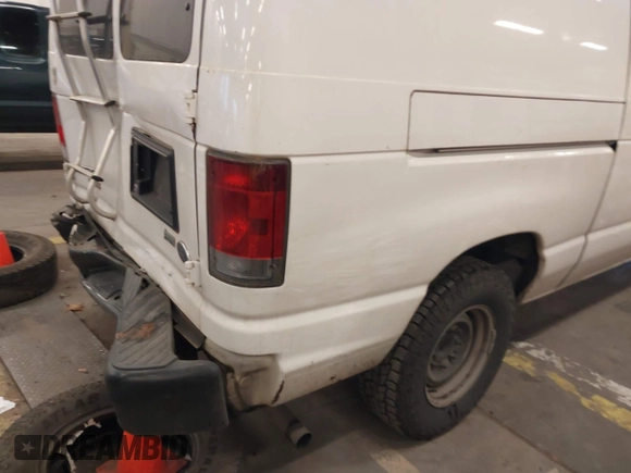 2011 Ford Econoline Cargo Commercial with VIN 1FTNE1EW5BDB01167, listed as a IAAI auction lot 41226859 with 248,606 mi miles and . Bid and sale history available at DreamBid. Image 21.