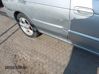 2002 Nissan Sentra GXE z VIN 3N1CB51DX2L663011, wystawiony jako IAAI lot #42533399 z przebiegiem 176 956 mil mil oraz . Historia ofert i sprzedaży dostępna na DreamBid. Obrazek 6.