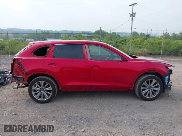 2021 Mazda CX-9 Signature with VIN JM3TCBEY2M0509874, listed as a IAAI auction lot 42492202 with 69,153 mi miles and . Bid and sale history available at DreamBid. Image 14.