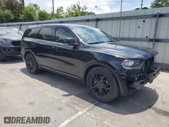 2015 Dodge Durango R/T with VIN 1C4SDHCT3FC907348, listed as a Copart auction lot 59880905 with 141,162 mi miles and Salvage title. Bid and sale history available at DreamBid. Image 4.