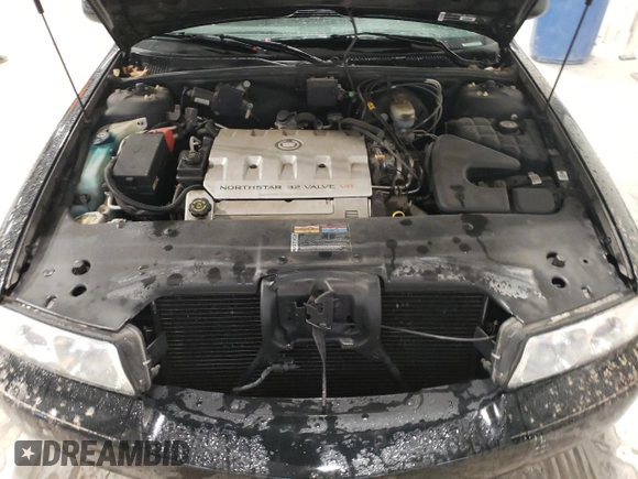 2002 Cadillac Seville Touring STS z VIN 1G6KY54962U158476, wystawiony jako Copart lot #86624774 z przebiegiem 77 818 mil mil oraz Szkoda całkowita • Salvage title. Historia ofert i sprzedaży dostępna na DreamBid. Obrazek 11.