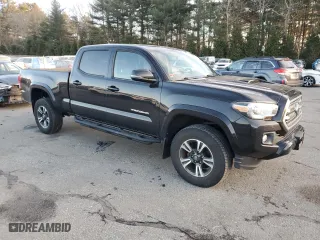 2017 Toyota Tacoma SR5 with VIN 3TMDZ5BN0HM031299, listed as a Copart auction lot 42693615 with 144,135 mi miles and Salvage Title. Bid and sale history available at carsss.com. Image 4.