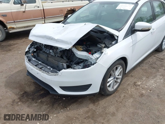 2016 Ford Focus SE with VIN 1FADP3F21GL403121, listed as a IAAI auction lot 42130743 with 103,592 mi miles and . Bid and sale history available at DreamBid. Image 6.