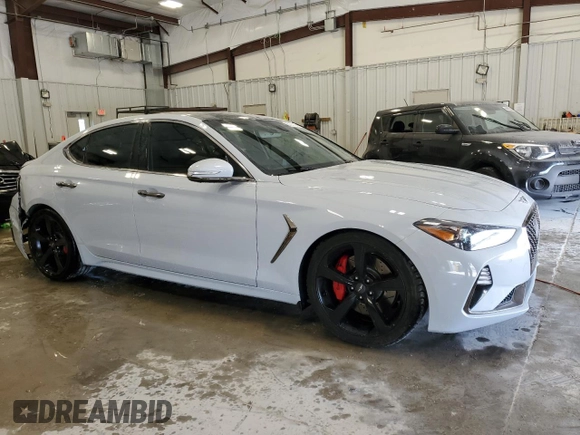 2020 Genesis G70 3.3T with VIN KMTG34LE6LU048573, listed as a Copart auction lot 67907884 with 63,531 mi miles and Salvage Title. Bid and sale history available at carsss.com. Image 4.