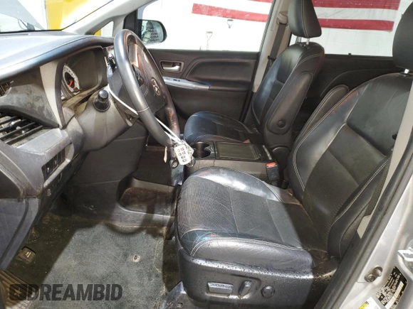 2017 Toyota Sienna SE with VIN 5TDXZ3DC6HS852078, listed as a Copart auction lot 51044615 with 81,552 mi miles and Salvage title. Bid and sale history available at DreamBid. Image 7.
