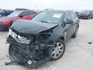 2015 Cadillac SRX Premium Collection z VIN 3GYFNDE3XFS576695, wystawiony jako IAAI lot #41612836 z przebiegiem Nie podano mil oraz . Historia ofert i sprzedaży dostępna na DreamBid. Obrazek 6.