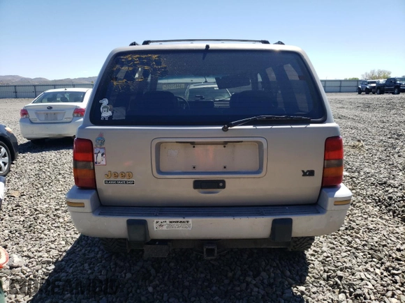 1994 Jeep Grand Cherokee Limited with VIN 1J4GZ78Y0RC190766, listed as a Copart auction lot 54628055 with 217,270 mi miles and Salvage title. Bid and sale history available at DreamBid. Image 6.