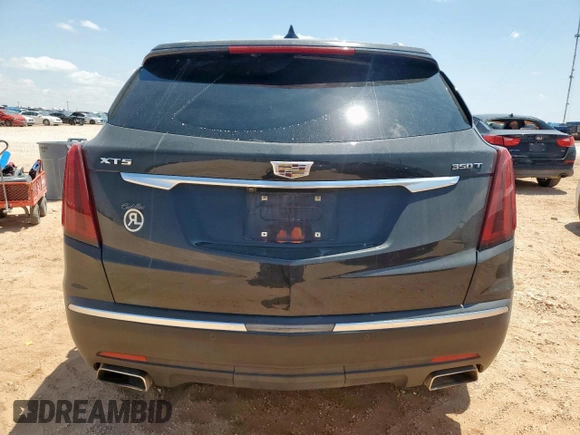 2020 Cadillac XT5 Luxury FWD z VIN 1GYKNAR47LZ173823, wystawiony jako Copart lot #56770025 z przebiegiem 74 192 mil mil oraz Szkoda całkowita • Salvage title. Historia ofert i sprzedaży dostępna na DreamBid. Obrazek 6.