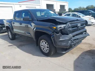 2024 Toyota Tacoma 4WD SR5 with VIN 3TMLB5JN5RM052698, listed as a IAAI auction lot 41427313 with 9,624 mi miles. Bid and sale history available at carsss.com. Image 1.