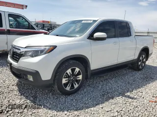 2020 Honda Ridgeline RTL with VIN 5FPYK3F56LB020252, listed as a Copart auction lot 52200475 with 105,026 mi miles and Salvage title. Bid and sale history available at DreamBid. Image 1.