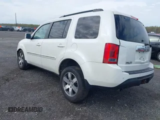 2014 Honda Pilot Touring with VIN 5FNYF4H97EB046879, listed as a IAAI auction lot 42017280 with 167,564 mi miles and . Bid and sale history available at carsss.com. Image 3.