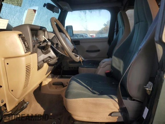 2002 Jeep Wrangler Sahara with VIN 1J4FA59S12P757177, listed as a Copart auction lot 42808925 with 71,049 mi miles and Clean title. Bid and sale history available at DreamBid. Image 7.