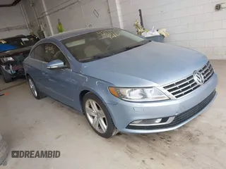 2013 Volkswagen CC Sport with VIN WVWBP7AN1DE567561, listed as a IAAI auction lot 42174906 with 157,827 mi miles. Bid and sale history available at carsss.com. Image 1.