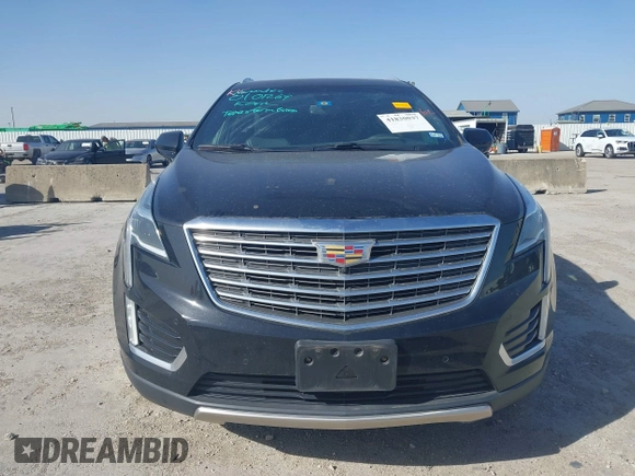 2017 Cadillac XT5 Platinum AWD z VIN 1GYKNFRS7HZ103127, wystawiony jako IAAI lot #41830037 z przebiegiem 82 480 mil mil oraz . Historia ofert i sprzedaży dostępna na DreamBid. Obrazek 13.