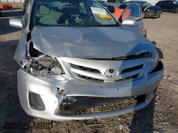 2012 Toyota Corolla L with VIN 2T1BU4EEXCC862368, listed as a IAAI auction lot 41829011 with 195,056 mi miles. Bid and sale history available at carsss.com. Image 6.