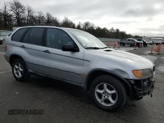 2001 BMW X5 3.0i with VIN WBAFA53561LM65536, listed as a Copart auction lot 84695444 with 122,849 mi miles and Salvage Title. Bid and sale history available at carsss.com. Image 4.