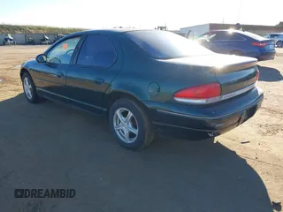 1997 Chrysler Cirrus LXi z VIN 1C3EJ56H2VN720573, wystawiony jako IAAI lot #41250503 z przebiegiem 176 046 mil mil oraz . Historia ofert i sprzedaży dostępna na DreamBid. Obrazek 3.