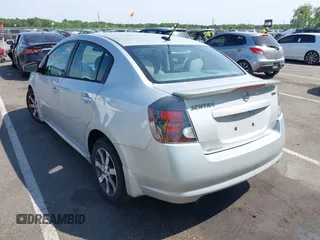 2012 Nissan Sentra S z VIN 3N1AB6AP5CL763977, wystawiony jako IAAI lot #42252346 z przebiegiem 170 117 mil mil oraz . Historia ofert i sprzedaży dostępna na DreamBid. Obrazek 3.