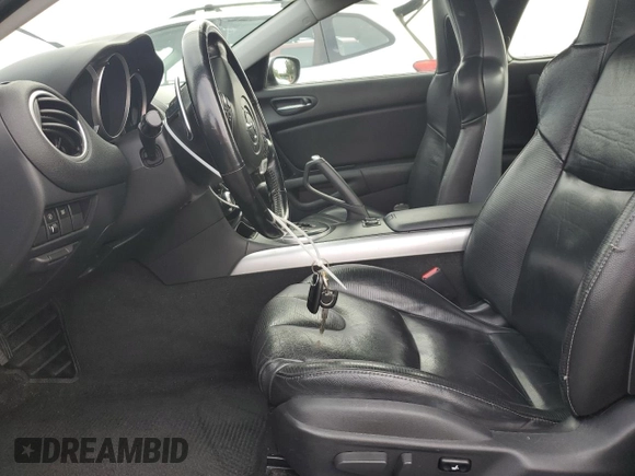 2004 Mazda RX-8 with VIN JM1FE17N740117681, listed as a Copart auction lot 85284094 with 138,555 mi miles and Salvage Title. Bid and sale history available at DreamBid. Image 7.