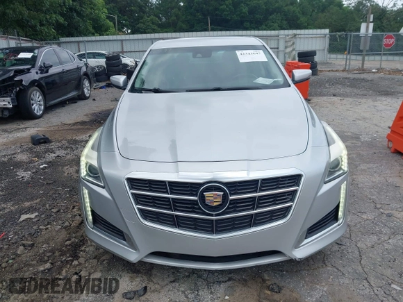 2014 Cadillac CTS Luxury RWD z VIN 1G6AR5S38E0173628, wystawiony jako IAAI lot #42343647 z przebiegiem 166 035 mil mil oraz . Historia ofert i sprzedaży dostępna na DreamBid. Obrazek 12.