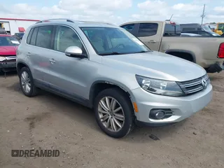 2012 Volkswagen Tiguan S z VIN WVGAV7AX3CW570419, wystawiony jako IAAI lot #42482454 z przebiegiem 142 284 mil mil oraz . Historia ofert i sprzedaży dostępna na DreamBid. Obrazek 1.