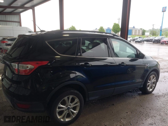 2017 Ford Escape SE with VIN 1FMCU0GD8HUB77633, listed as a IAAI auction lot 42158359 with 111,190 mi miles and . Bid and sale history available at DreamBid. Image 13.