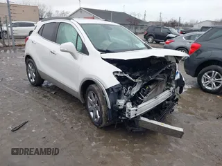 2016 Buick Encore Leather with VIN KL4CJCSB4GB649349, listed as a IAAI auction lot 41485324 with 124,764 mi miles. Bid and sale history available at carsss.com. Image 1.