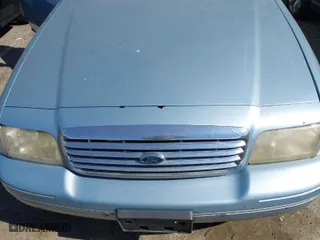 2004 Ford Crown Victoria LX with VIN 2FAFP74W64X121657, listed as a IAAI auction lot 41715463 with 205,885 mi miles. Bid and sale history available at carsss.com. Image 6.