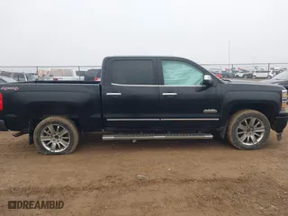 2015 Chevrolet Silverado 1500 High Country with VIN 3GCUKTEC9FG156512, listed as a IAAI auction lot 41452264 with 132,083 mi miles. Bid and sale history available at carsss.com. Image 13.