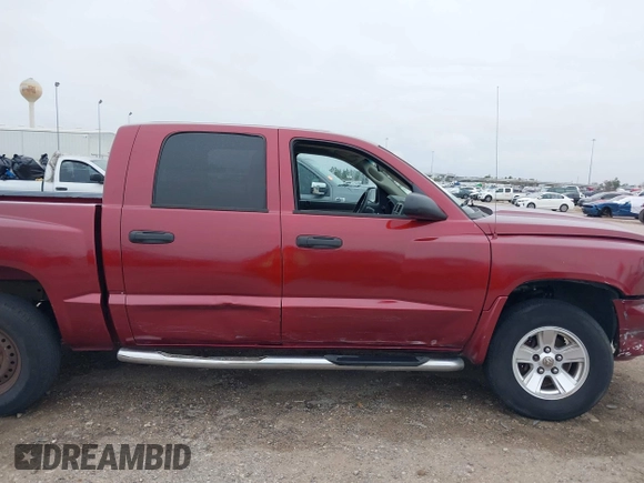 2006 Dodge Dakota SLT with VIN 1D7HE48KX6S598831, listed as a IAAI auction lot 41292884 with 173,181 mi miles and . Bid and sale history available at carsss.com. Image 13.