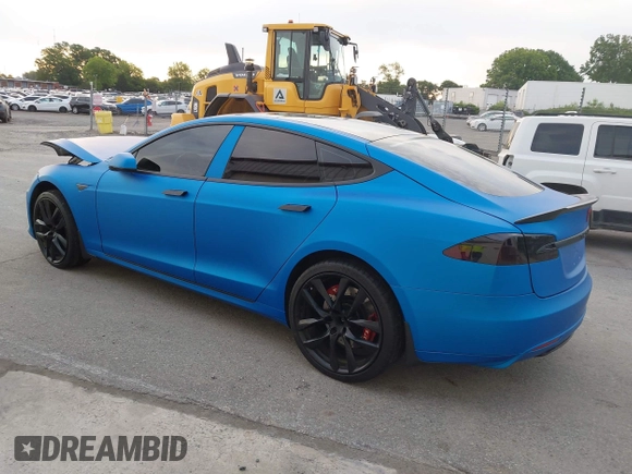 2013 Tesla Model S Performance with VIN 5YJSA1DP5DFP25345, listed as a IAAI auction lot 42288379 with 165,915 mi miles and . Bid and sale history available at DreamBid. Image 3.