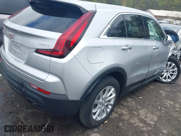 2019 Cadillac XT4 FWD Luxury z VIN 1GYAZAR43KF160132, wystawiony jako IAAI lot #41941512 z przebiegiem 68 835 mil mil oraz . Historia ofert i sprzedaży dostępna na DreamBid. Obrazek 4.