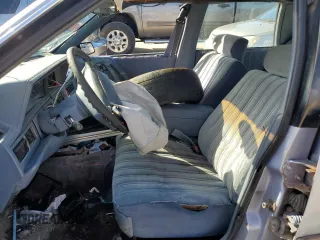 1994 Oldsmobile Cutlass Ciera S z VIN 1G3AG55M7R6358716, wystawiony jako Copart lot #60912854 z przebiegiem 122 565 mil mil oraz Nie do naprawy. Historia ofert i sprzedaży dostępna na DreamBid. Obrazek 7.