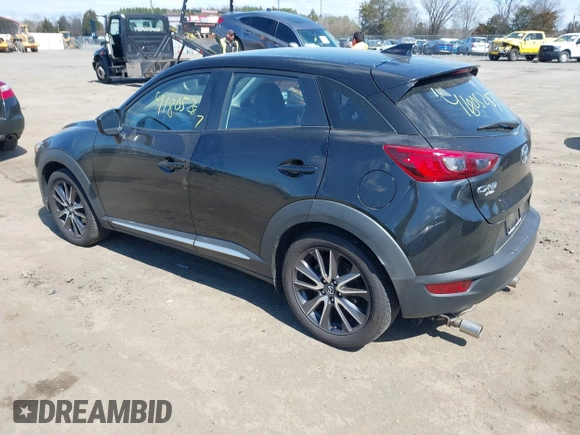 2018 Mazda CX-3 Grand Touring z VIN JM1DKFD75J0312662, wystawiony jako IAAI lot #41805287 z przebiegiem 140 083 mil mil oraz . Historia ofert i sprzedaży dostępna na DreamBid. Obrazek 3.
