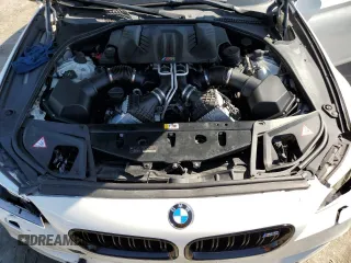2014 BMW M5 with VIN WBSFV9C57ED097570, listed as a Copart auction lot 88571785 with 100,391 mi miles and Salvage Title. Bid and sale history available at carsss.com. Image 11.
