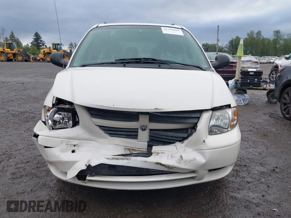 2005 Dodge Caravan SE z VIN 1D4GP24R25B364143, wystawiony jako IAAI lot #42296019 z przebiegiem 140 496 mil mil oraz . Historia ofert i sprzedaży dostępna na DreamBid. Obrazek 11.