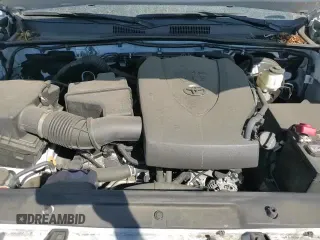 2023 Toyota Tacoma TRD Off Road z VIN 3TMDZ5BNXPM144031, wystawiony jako Copart lot #81691815 z przebiegiem 21 799 mil mil oraz Szkoda całkowita • Salvage title. Historia ofert i sprzedaży dostępna na DreamBid. Obrazek 13.