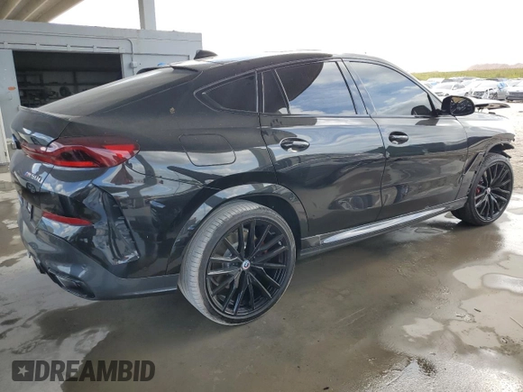 2023 BMW X6 M50i with VIN 5UXCY8C01P9S00552, listed as a Copart auction lot 84193154 with 16,590 mi miles and Salvage Title. Bid and sale history available at carsss.com. Image 3.
