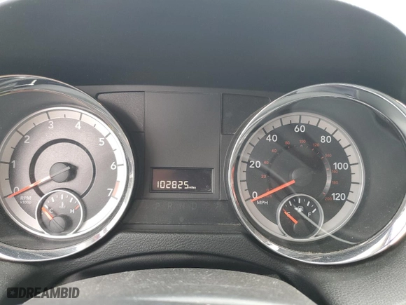2015 Dodge Grand Caravan SXT with VIN 2C4RDGCG7FR548735, listed as a Copart auction lot 51054015 with 102,825 mi miles and Salvage Title. Bid and sale history available at carsss.com. Image 9.