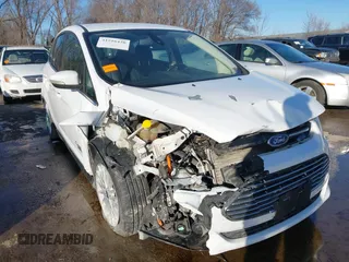 2016 Ford C-Max SEL z VIN 1FADP5CU2GL118381, wystawiony jako IAAI lot #41516426 z przebiegiem 220 361 mil mil oraz . Historia ofert i sprzedaży dostępna na DreamBid. Obrazek 6.