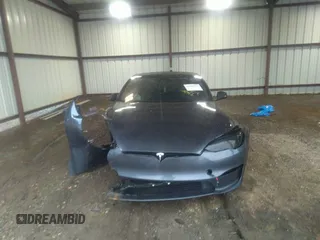 2022 Tesla Model S with VIN 5YJSA1E57NF484158, listed as a IAAI auction lot 41531574 with 16,079 mi miles and . Bid and sale history available at DreamBid. Image 12.