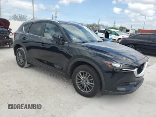 2021 Mazda CX-5 Touring z VIN JM3KFBCM8M1436782, wystawiony jako Copart lot #54144645 z przebiegiem 52 388 mil mil oraz Szkoda całkowita • Salvage title. Historia ofert i sprzedaży dostępna na DreamBid. Obrazek 4.