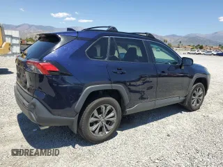 2022 Toyota RAV4 Hybrid XLE Premium z VIN 4T3B6RFV5NU097584, wystawiony jako Copart lot #56163835 z przebiegiem 25 016 mil mil oraz Szkoda całkowita • Salvage title. Historia ofert i sprzedaży dostępna na DreamBid. Obrazek 3.