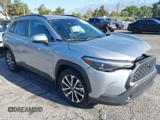 2024 Toyota Corolla Cross XLE with VIN 7MUDAAAG2RV097878, listed as a IAAI auction lot 42674859 with 8,558 mi miles and . Bid and sale history available at DreamBid. Image 1.